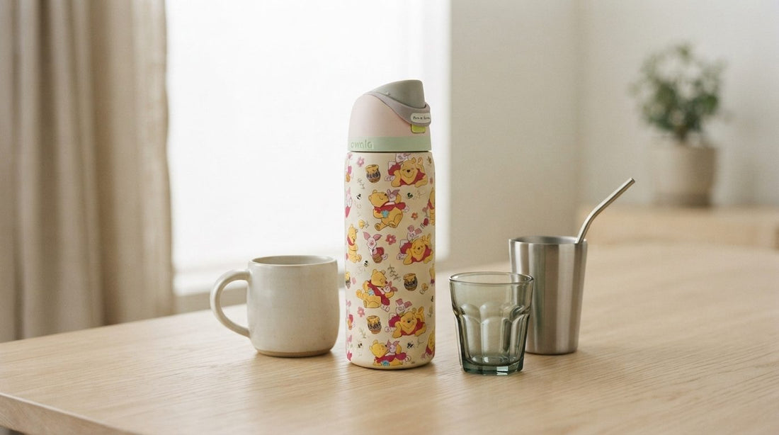 Wearrizzy drinkware grouped on a pale oak table