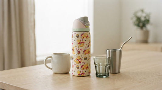 Wearrizzy drinkware grouped on a pale oak table